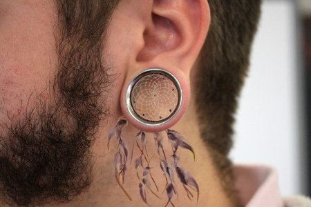 How to grow holes in your ears?