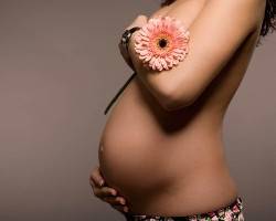 Как ведет себя грудь с имплантами после родов?